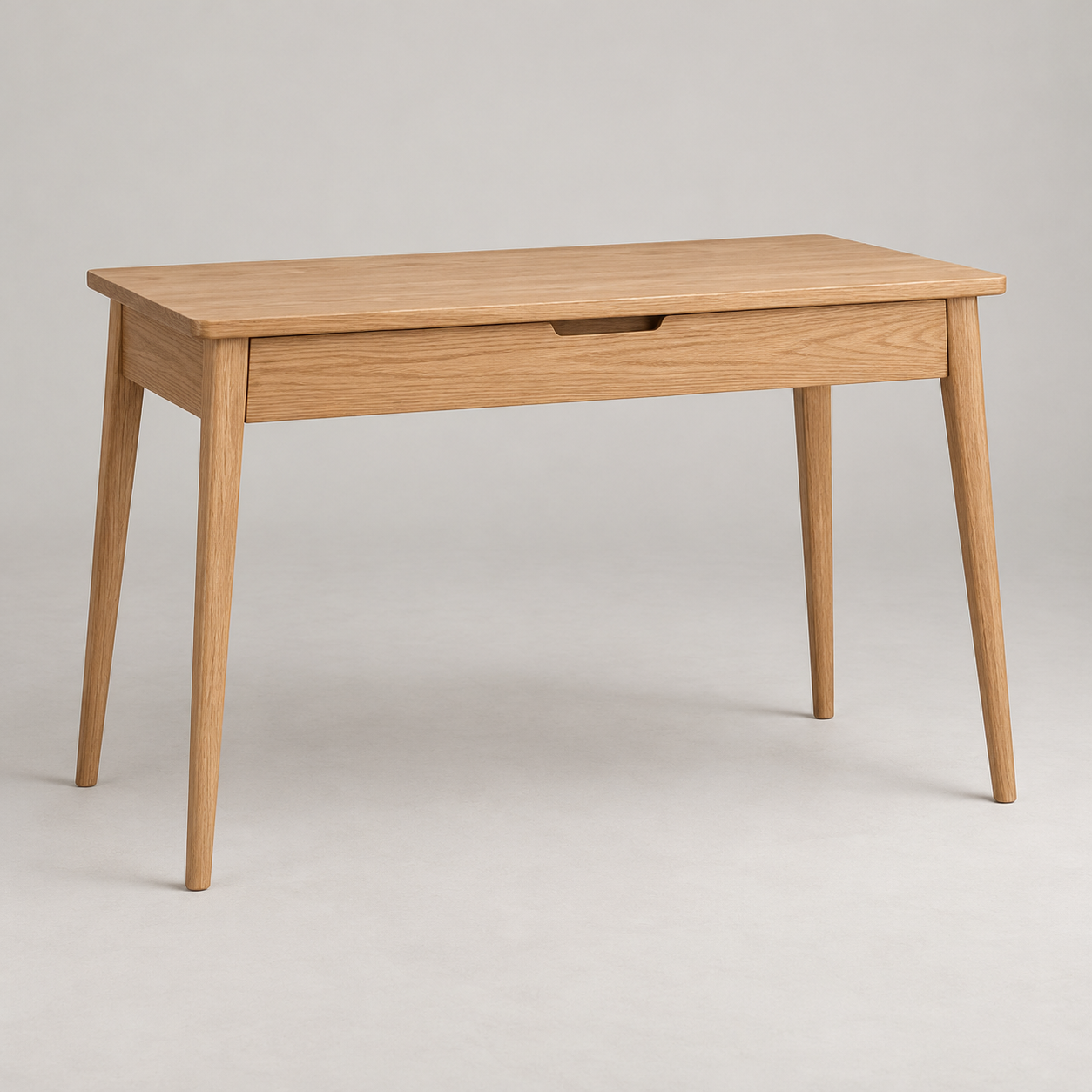 Linea Writing Desk on a pale studio background